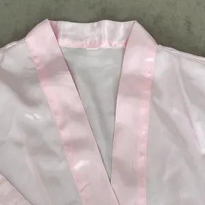 Silk robe with pockets. Belt included. Short sleeve. Color- pink. Size small thumbnail 2