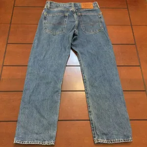 Levi’s 551 women’s medium wash jeans 27 thumbnail 8