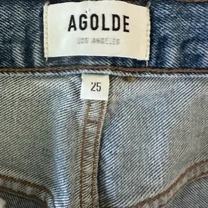 Like New Agolde 90’s pinch waist distressed jeans thumbnail 9
