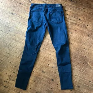 American Eagle navy minimalist 4 long stretchy jeggings thumbnail 4