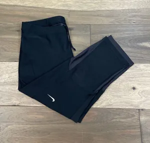 Nike Leggings Black Capri Dri‑Fit Hidden Tie Waist Size M thumbnail 1