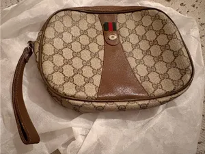 Preloved vintage GG Supreme clutch project has COA thumbnail 1