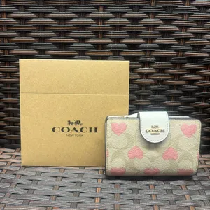 coach Medium Corner Zip Wallet In Signature Canvas With Heart Print cq146 thumbnail 1