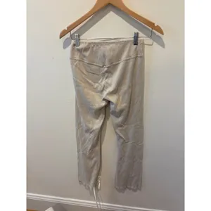 FP Movement High Waisted Ribbed Flare Leggings Beige Lettuce Edge Size M/L thumbnail 2