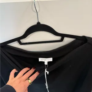 ANNI+CO Off-the-Shoulder Black Knit Sweater thumbnail 2