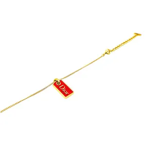 Christian Dior Gold Tone Red Dior Enamel Tag Charm Bracelet thumbnail 3