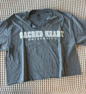 MV Sport Soft gray short sleeve tee with bold "Sacred Heart University" front print. Relaxed fit and casual style. Classic collegiate graphic perfect for layering. thumbnail 1