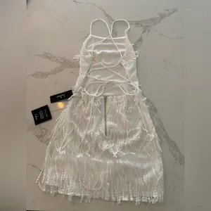 Lulu’s Making Magic White Fringe Lace-Up Mini Homecoming Dress thumbnail 3