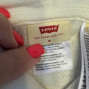 1460‎ | NWT Levis Cropped Relaxed Logo Hooded Sweatshirt Cream Womens M thumbnail 5
