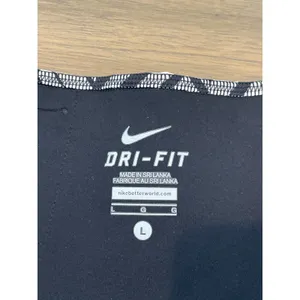 Nike Dri‑Fit Size L Black & White Print Capri Leggings thumbnail 5