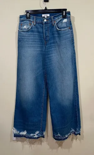 RE/DONE Mid-Rise Wide Leg Jeans in a light wash with raw, distressed hems SZ 23 thumbnail 1