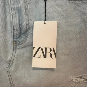 New Zara Ripped Denim Mini Skirt Sz L Distressed Hem Light Blue NWT thumbnail 6