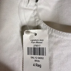 L.L. bean signature mid rise flare jeans in white denim thumbnail 6