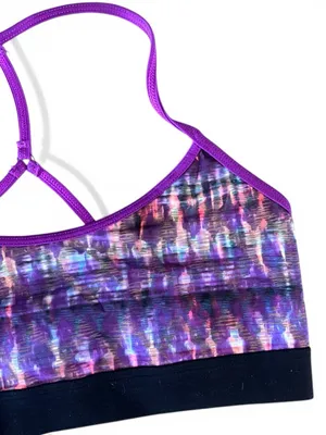 Alo Yoga racerback Spark sports bra featuring a purple abstract print thumbnail 5