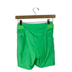 Fabletics High-Waisted Solid Biker Shorts Green Neon Athletic Pockets Size XS thumbnail 3