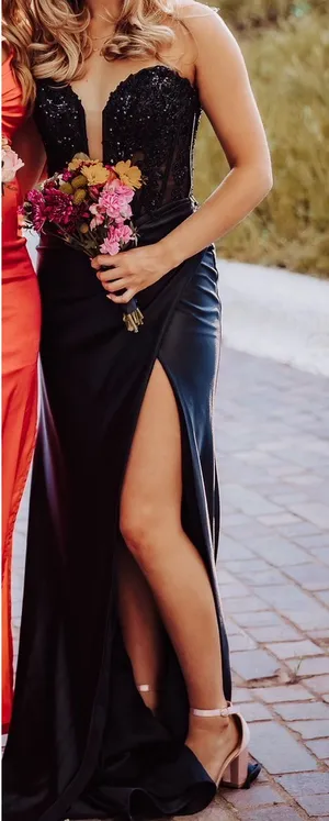 Black prom dress with high slit and sequin top #prom #eveningwear #formal brand is NOX annabelle, Fits like a small, size 4. original price 320. I am 5'2 and there was a lot of length left on the dress thumbnail 1