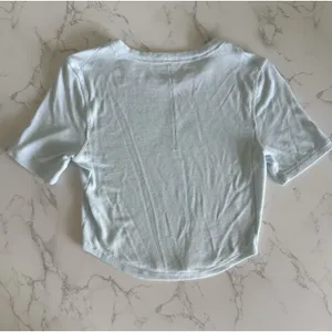 Lululemon Hold Tight Cropped Short Sleeve Ribbed TShirt ~4 Light Blue Curved Hem thumbnail 9