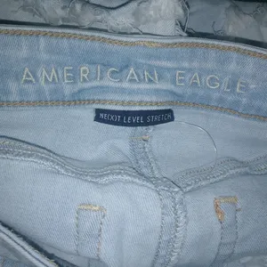 American Eagle 2 High Rise Shorty Jeans Light Wash Raw Hem Shorts thumbnail 2
