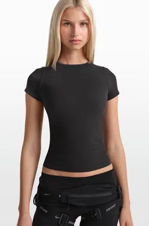 SKIMS Nike Ribbed Seamless Women’s Short-Sleeve Top in Black thumbnail 1