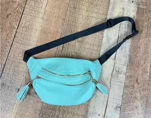 Claire's Pastel Turquoise Belt Bag Fanny Pack Tassel Retro Y2K Western thumbnail 1