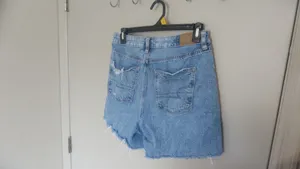 American Eagle Outfitters baggy mom short shorts ripped in light wash blue size 4. thumbnail 10