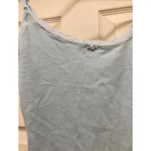 SKIMS Retired NWT Size Large Pointelle thong bodysuit top sky blue LOGO thumbnail 6