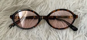 Trendy Oval tortoise shell colored pink tinted sunglasses with gold accents thumbnail 1