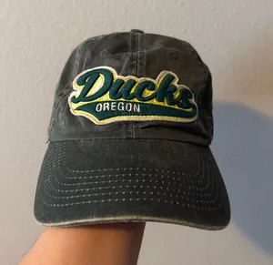 Top Of The World Oregon Ducks Distressed Green Adjustable Hat thumbnail 1