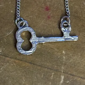 Silver tone dainty skeleton key necklace thumbnail 5