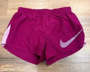 Nike Women's Magenta Athletic Running Shorts with Pink Swoosh size medium thumbnail 1