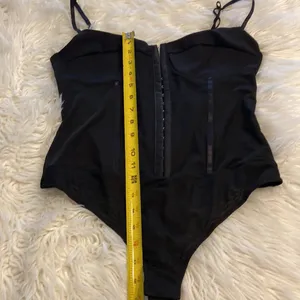 Free People Bodysuit size L color black adjustable stripes please see all photos thumbnail 14