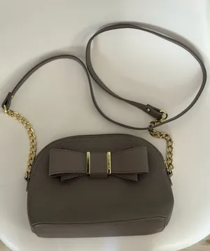 Taupe bow crossbody bag thumbnail 1