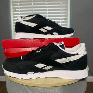 Reebok Unisex Classic Nylon Running Shoes, Black/White, US M9 W10.5 thumbnail 1