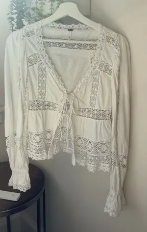 Free People white lace blouse with tie front and long sleeves thumbnail 1