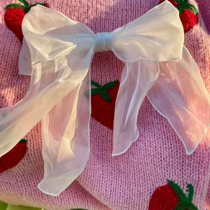 White cream hair bow thumbnail 1