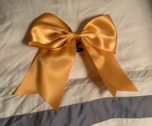 Gold cheer bow thumbnail 1