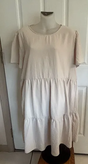 XL Copper Key solid cream tiered short sleeve flowy babydoll dress. thumbnail 1