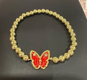 Kendra Scott | Gold Plated Beaded Stretch Bracelet with Red Butterfly thumbnail 1