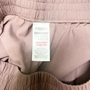 Gymshark women’s brown purplish pull on active running shorts thumbnail 7