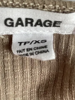 Garage Ribbed Cropped Tank Top in Beige thumbnail 5