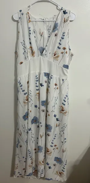 White dress with flowers. Used but in good condition. Size 14 thumbnail 1