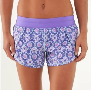 Lululemon Purple Floral Twiggy Run Shorts thumbnail 1