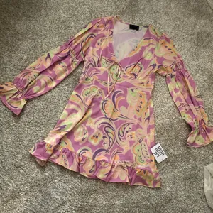 New without tag ASOS elasticated sleeve tie neck mini dress in pink floral print thumbnail 6