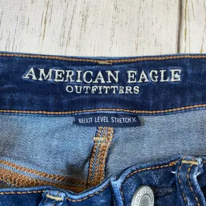 American Eagle Next Level Stretch Distressed Midi Denim Jean Shorts thumbnail 6