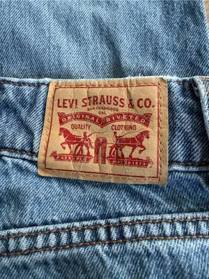 Levi's light blue denim jeans with tan leather patch thumbnail 3