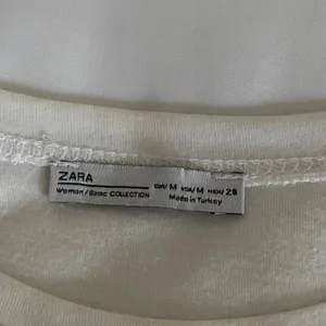 Zara White Tee with Silver Sequin Waves Size M thumbnail 4
