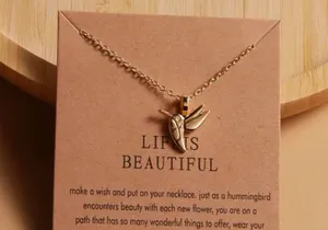 Hummingbird pendant necklace thumbnail 1
