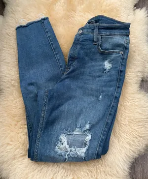 Old Navy Women's Distressed Super Skinny Jeans in Blue thumbnail 1