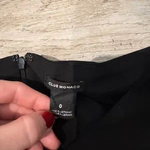 Club Monaco Black Pencil Skirt with Leather Pockets Size 0 thumbnail 4
