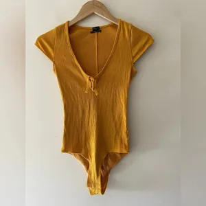 Urban Outfitters Out From Under‎ Mustard Teresa Tie-Front Ribbed Bodysuit thumbnail 3